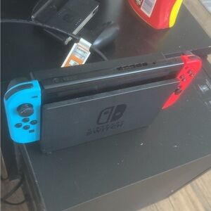Nintendo Switch Console with Neon Blue and Red Joy-Con